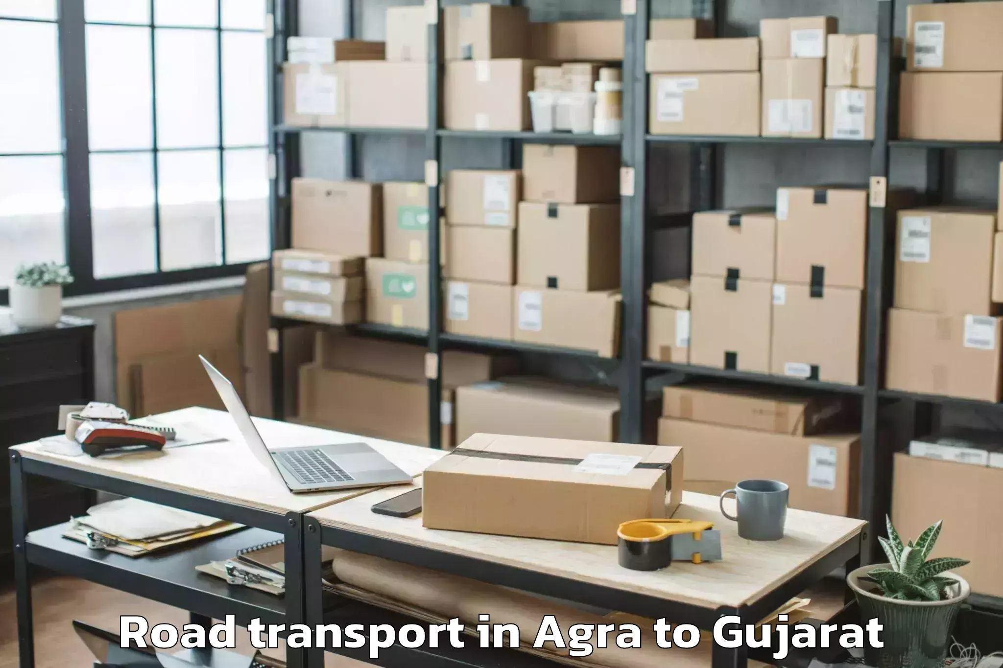 Book Agra to Bhiloda Road Transport Online